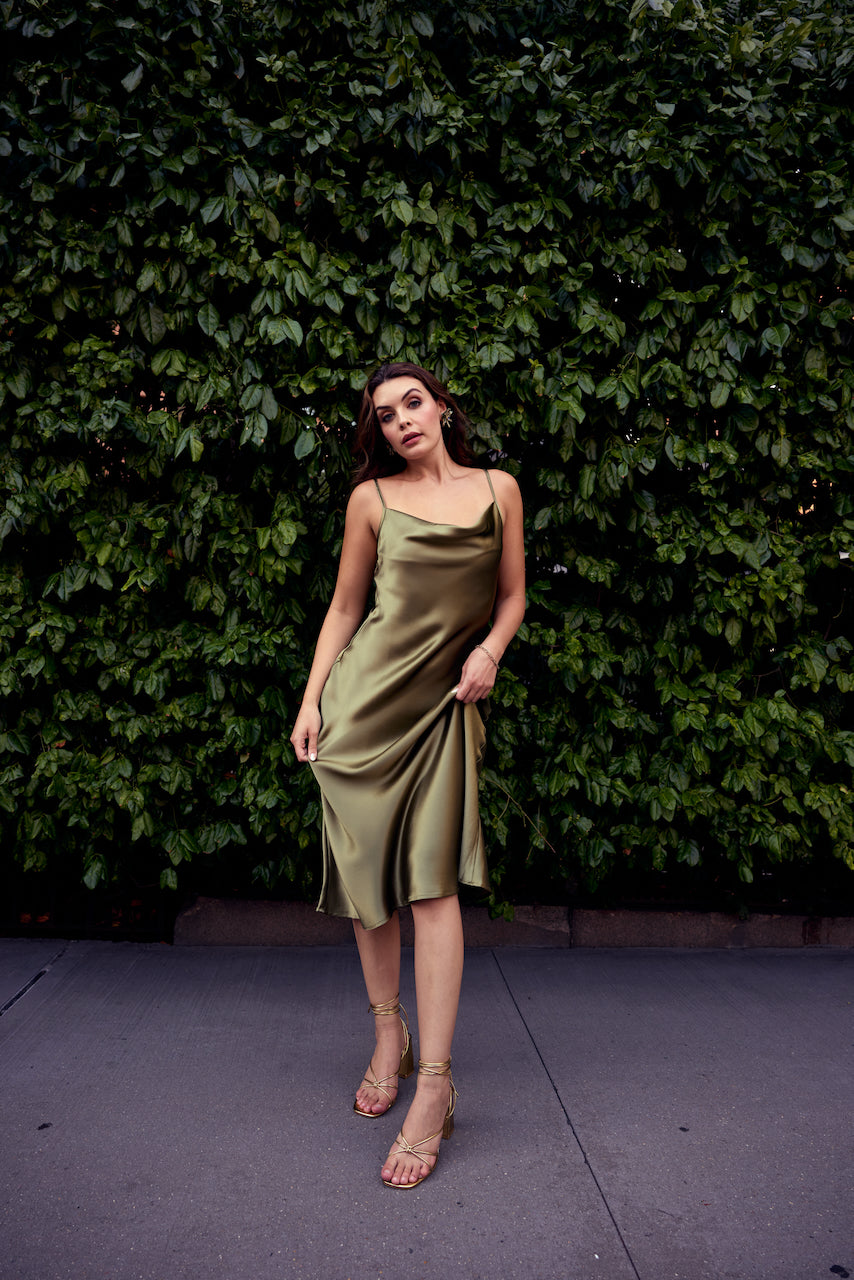Olive Slip Dress with a sleek, fluid silhouette designed for refined evening occasions.
