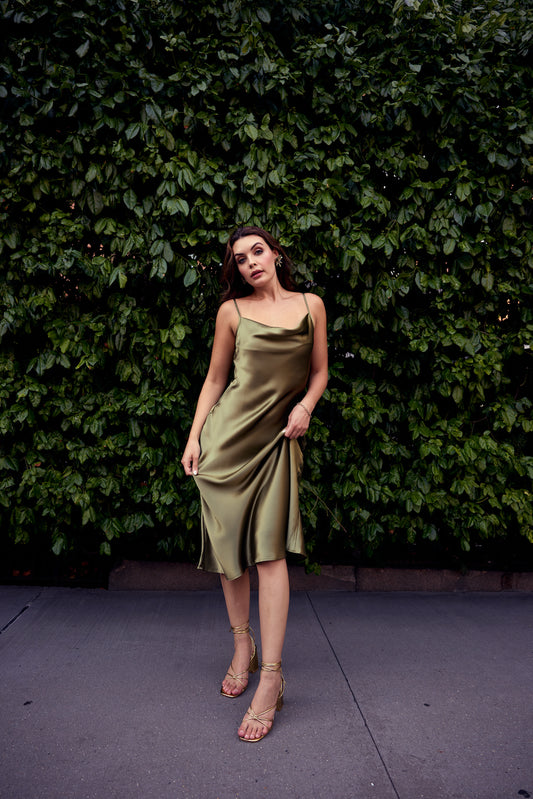 Olive Slip Dress with a sleek, fluid silhouette designed for refined evening occasions.